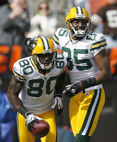 CLEVELAND, OH - OCTOBER 25:  Donald Driver #80 and Greg Jennings #85 of the Green Bay Packers celebrate after scoring a touchdown against the Cleveland Browns at Cleveland Browns Stadium on October 25, 2009 in Cleveland, Ohio.  <br /><br /><span class="help">(Photo by Matt Sullivan/Getty Images)</span>