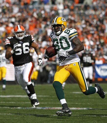 CLEVELAND, OH - OCTOBER 25:  Donald Driver #80 of the Green Bay Packers scores a touchdown in front of Kaluka Maiava #56 of the Cleveland Browns at Cleveland Browns Stadium on October 25, 2009 in Cleveland, Ohio.  <br /><br /><span class="help">(Photo by Matt Sullivan/Getty Images)</span>