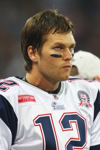 LONDON, ENGLAND - OCTOBER 25:  Tom Brady (#12) of the New England Patriots looks focused prior to the NFL International Series match between New England Patriots and Tampa Bay Buccaneers at Wembley Stadium on October 25, 2009 in London, England. This is the third occasion where a regular season NFL match has been played in London.  <br /><br /><span class="help">(Photo by Julian Finney/Getty Images)</span>