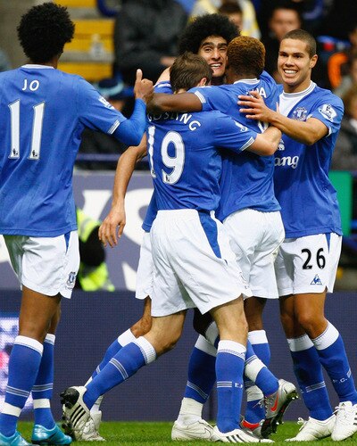 BOLTON, ENGLAND - OCTOBER 25: Marouane Fellaini of Everton is surrounded by team mates after scoring during the Barclays Premier League match between Bolton Wanderers and Everton at Reebok Stadium on October 25, 2009 in Bolton, England.  <br /><br /><span class="help">(Photo by Jeff J Mitchell/Getty Images)</span>