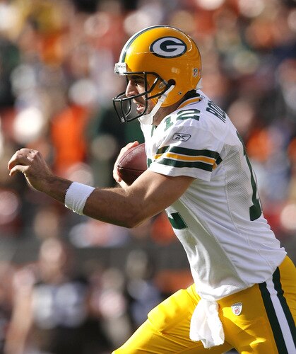 CLEVELAND, OH - OCTOBER 25:  Aaron Rodgers #12 of the Green Bay Packers runs against the Cleveland Browns at Cleveland Browns Stadium on October 25, 2009 in Cleveland, Ohio.  <br /><br /><span class="help">(Photo by Matt Sullivan/Getty Images)</span>