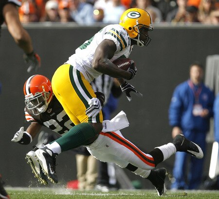 CLEVELAND, OH - OCTOBER 25:  Donald Lee #86 of the Green Bay Packers is hit by Brandon McDonald #22 of the Cleveland Browns at Cleveland Browns Stadium on October 25, 2009 in Cleveland, Ohio.  <br /><br /><span class="help">(Photo by Matt Sullivan/Getty Images)</span>