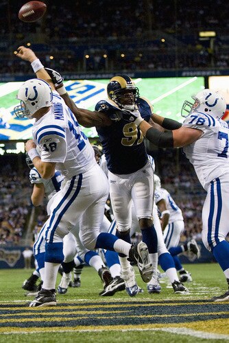 ST. LOUIS, MO - OCTOBER 25: Leonard Little #91 of the St. Louis Rams pressures Peyton Manning #18 of the Indianapolis Colts at the Edward Jones Dome on October 25, 2009 in St. Louis, Missouri.  <br /><br /><span class="help">(Photo by Dilip Vishwanat/Getty Images)</span>