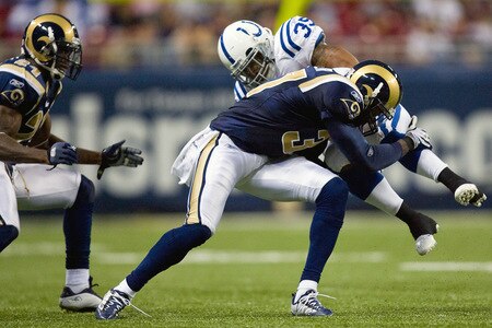 ST. LOUIS, MO - OCTOBER 25: Chad Simpson #35 of the Indianapolis Colts is tackled by James Butler #37 the St. Louis Rams at the Edward Jones Dome on October 25, 2009 in St. Louis, Missouri.  The Colts beat the Rams 42-6.  <br /><br /><span class="help">(Photo by Dilip Vishwanat/Getty Images)</span>