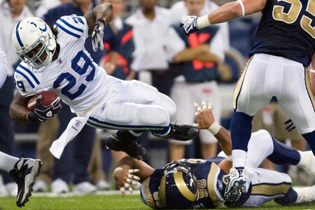 ST. LOUIS, MO - OCTOBER 25: Joseph Addai #29 of the Indianapolis Colts is tripped up against the St. Louis Rams at the Edward Jones Dome on October 25, 2009 in St. Louis, Missouri.  The Colts beat the Rams 42-6.  <br /><br /><span class="help">(Photo by Dilip Vishwanat/Getty Images)</span>