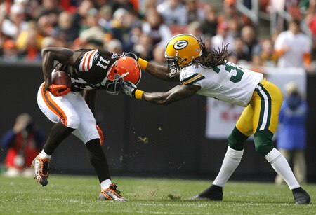 CLEVELAND, OH - OCTOBER 25:  Al Harris #31 of the Green Bay Packers tackles Mohamed Massaquoi #11 of the Cleveland Browns at Cleveland Browns Stadium on October 25, 2009 in Cleveland, Ohio.  <br /><br /><span class="help">(Photo by Matt Sullivan/Getty Images)</span>