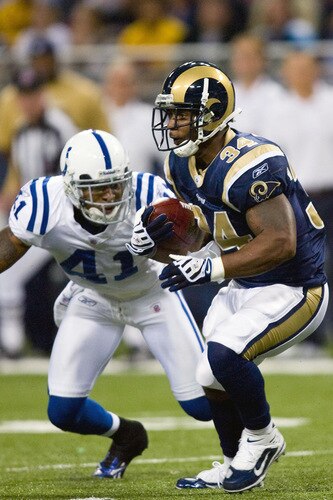 ST. LOUIS, MO - OCTOBER 25: Kenneth Darby #34 of the St. Louis Rams looks to get past Antoine Bethea #41of the Indianapolis Colts at the Edward Jones Dome on October 25, 2009 in St. Louis, Missouri.  <br /><br /><span class="help">(Photo by Dilip Vishwanat/Getty Images)</span>