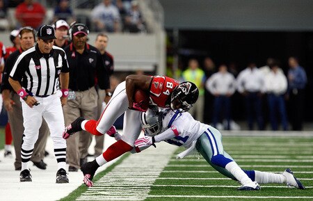 ARLINGTON, TX - OCTOBER 25:  Wide receiver Roddy White #84 of the Atlanta Falcons is tackled by Terence Newman #41 of the Dallas Cowboys at Cowboys Stadium on October 25, 2009 in Arlington, Texas.  <br /><br /><span class="help">(Photo by Ronald Martinez/Getty Images)</span>