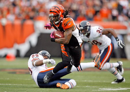 CINCINNATI - OCTOBER 25:  Bernard Scott #28 of the Cincinnati Bengals is tripped by Lance Briggs #55 of the Chicago Bears during the NFL game at Paul Brown Stadium on October 25, 2009 in Cincinnati, Ohio.  The Bengals won 45-10.  <br /><br /><span class="help">(Photo by Andy Lyons/Getty Images)</span>