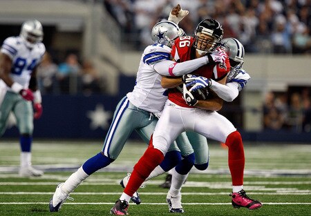 ARLINGTON, TX - OCTOBER 25:  Wide receiver Brian Finneran #86 of the Atlanta Falcons is tackled by Terence Newman #41 and Gerald Sensabaugh #43 of the Dallas Cowboys at Cowboys Stadium on October 25, 2009 in Arlington, Texas.  <br /><br /><span class="help">(Photo by Ronald Martinez/Getty Images)</span>