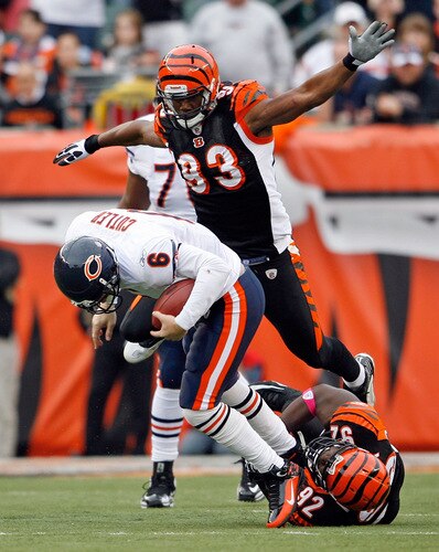 CINCINNATI - OCTOBER 25:  Jay Cutler #6 of the Chicago Bears is sacked by Michael Johnson #93 and Frostee Rucker #92 of the Cincinnati Bengals at Paul Brown Stadium on October 25, 2009 in Cincinnati, Ohio. The Bengals won 45-10.  <br /><br /><span class="help">(Photo by Andy Lyons/Getty Images)</span>