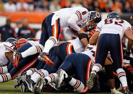 CINCINNATI - OCTOBER 25:  Jay Cutler #6 of the Chicago Bears leaps for a first down during the NFL game against the Cincinnati Bengals at Paul Brown Stadium on October 25, 2009 in Cincinnati, Ohio.  The Bengals won 45-10.<br /><br /><span class="help">(Photo by Andy Lyons/Getty Images)</span>