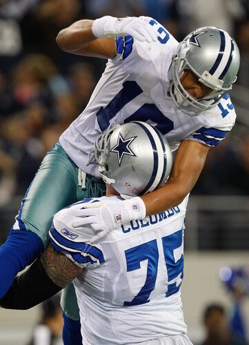 ARLINGTON, TX - OCTOBER 25:  Wide receiver Miles Austin #19 of the Dallas Cowboys celebrates a touchdown with Marc Colombo #75 against the Atlanta Falcons at Cowboys Stadium on October 25, 2009 in Arlington, Texas.  <br /><br /><span class="help">(Photo by Ronald Martinez/Getty Images)</span>