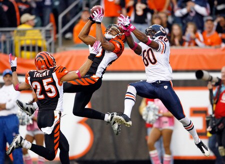 CINCINNATI - OCTOBER 25:  Leon Hall #29 of the Cincinnati Bengals intercepts the ball in front of Earl Bennett #80 of the Chicago Bears during the NFL game at Paul Brown Stadium on October 25, 2009 in Cincinnati, Ohio.  The Bengals won 45-10.  <br /><br /><span class="help">(Photo by Andy Lyons/Getty Images)</span>