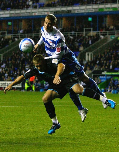READING, ENGLAND - OCTOBER 26:  Martyn Waghorn of Leicester City is challenged by Matthew Mills of Reading during the Coca-Cola Championship match between Reading and Leicester City at the Madejski Stadium on October 26, 2009 in Reading, England.  <br /><br /><span class="help">(Photo by Clive Rose/Getty Images)</span>