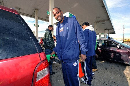 PHILADELPHIA - OCTOBER 26: Elton Brand of the Philadelphia 76ers  fills up a gas tank during a Paint the Town event on October 26, 2009 at the BP gas station in Philadelphia, Pennsylvania.  <br /><br /><span class="help">(Photo by Jesse D. Garrabrant/NBAE via Getty Images)</span>