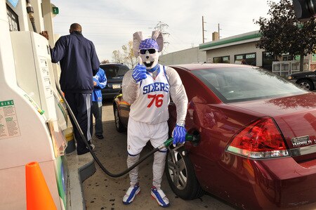 PHILADELPHIA - OCTOBER 26: Hip Hop, mascot of the Philadelphia 76ers, fills up a gas tank during a Paint the Town event on October 26, 2009 at the BP gas station in Philadelphia, Pennsylvania.  <br /><br /><span class="help">(Photo by Jesse D. Garrabrant/NBAE via Getty Images)</span>