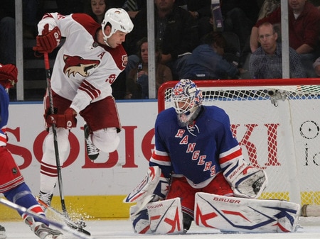 NEW YORK - OCTOBER 26: Henrik Lundqvist #30 of the New York Rangers makes the stop as Ed Jovanovski #55 of the Phoenix Coyotes jumps to avoid the puck at Madison Square Garden on October 26, 2009 in New York, New York. <br /><br /><span class="help">(Photo by Bruce Bennett/Getty Images)</span>