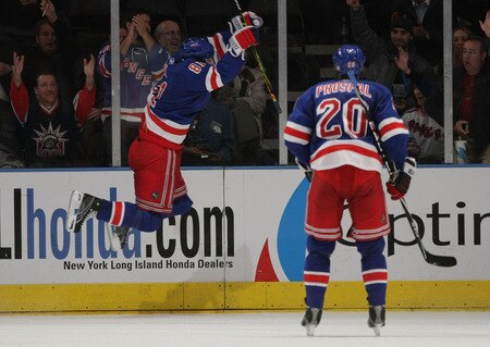 NEW YORK - OCTOBER 26: Enver Lisin #81 of the New York Rangers jumps in celebration of his third period goal as Vaclac Prospal #20 skates towards him in their game against the Phoenix Coyotes at Madison Square Garden on October 26, 2009 in New York City.  The Rangers defeated the Coyotes 5-2. <br /><br /><span class="help">(Photo by Bruce Bennett/Getty Images)</span>