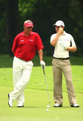 SINGAPORE - OCTOBER 27:  Darren Clark of Northern Ireland and Padraig Harrington (R) of Ireland during the practice round of the Barclays Singapore Open at Sentosa Golf Club on October 27, 2009 in Singapore, Singapore.  <br /><br /><span class="help">(Photo by Ian Walton/Getty Images)</span>