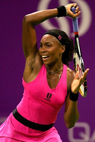 DOHA, QATAR - OCTOBER 27:  Venus Williams of the United States returns a shot to Elena Dementieva of Russia in game one of round robin play during the Sony Ericsson WTA Championships at the Khalifa International Tennis and Squash Complex on October 27, 2009 in Doha, Qatar.  <br /><br /><span class="help">(Photo by Matthew Stockman/Getty Images)</span>