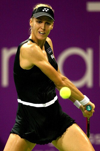 DOHA, QATAR - OCTOBER 27:  Elena Dementieva of Russia returns a shot to Venus Williams of the United States in game one of round robin play during the Sony Ericsson WTA Championships at the Khalifa International Tennis and Squash Complex on October 27, 2009 in Doha, Qatar.  <br /><br /><span class="help">(Photo by Matthew Stockman/Getty Images)</span>