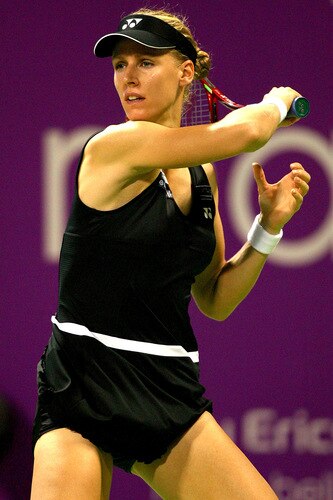 DOHA, QATAR - OCTOBER 27:  Elena Dementieva of Russia returns a shot to Venus Williams of the United States in game one of round robin play during the Sony Ericsson WTA Championships at the Khalifa International Tennis and Squash Complex on October 27, 2009 in Doha, Qatar.  <br /><br /><span class="help">(Photo by Matthew Stockman/Getty Images)</span>