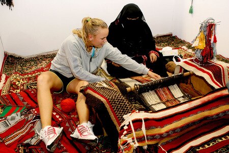 DOHA, QATAR - OCTOBER 27:  Caroline Wozniacki of Denmark learns traditional Qatari weaving during the Sony Ericsson WTA Championships at the Khalifa International Tennis and Squash Complex on October 27, 2009 in Doha, Qatar.  <br /><br /><span class="help">(Photo by Matthew Stockman/Getty Images)</span>