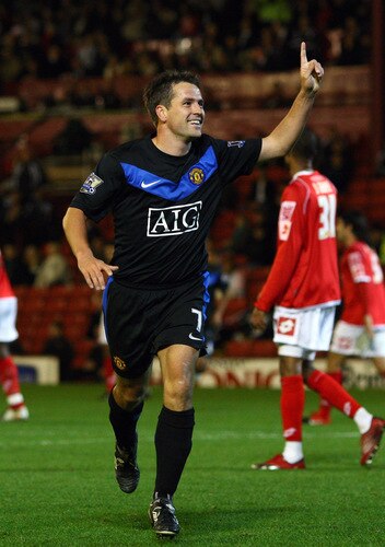 BARNSLEY, ENGLAND - OCTOBER 27:  Michael Owen of Manchester United celebrates after scoring the second goal during the Carling Cup 4th Round match between Barnsley and Manchester United at Oakwell on October 27, 2009 in Barnsley, England.  <br /><br /><span class="help">(Photo by Alex Livesey/Getty Images)</span>