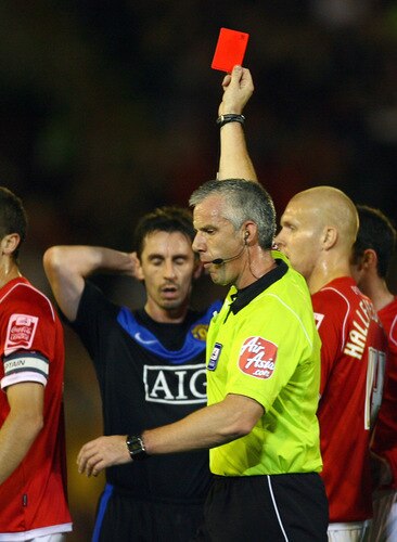 BARNSLEY, ENGLAND - OCTOBER 27:  Referee Chris Foy shows the red card to Gary Neville of Manchester United during the Carling Cup 4th Round match between Barnsley and Manchester United at Oakwell on October 27, 2009 in Barnsley, England.  <br /><br /><span class="help">(Photo by Alex Livesey/Getty Images)</span>
