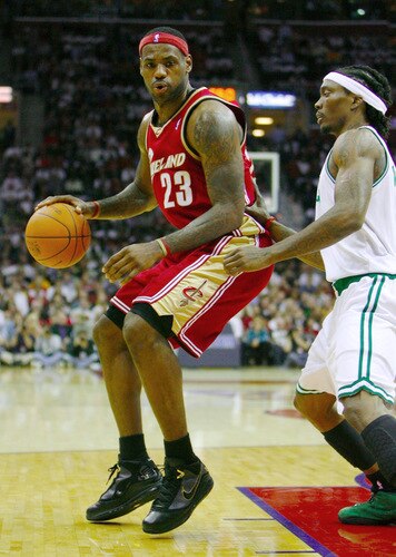 CLEVELAND - OCTOBER 27:  LeBron James #23 of the Cleveland Cavaliers drives the ball against Marquis Daniels #7 of the Boston Celtics during the season opener at Quicken Loans Arena on October 27, 2009 in Cleveland, Ohio.  <br /><br /><span class="help">(Photo by Gregory Shamus/Getty Images)</span>