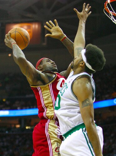 CLEVELAND - OCTOBER 27:  LeBron James #23 of the Cleveland Cavaliers puts up a shot against Rasheed Wallace #30 of the Boston Celtics during the season opener at Quicken Loans Arena on October 27, 2009 in Cleveland, Ohio.  <br /><br /><span class="help">(Photo by Gregory Shamus/Getty Images)</span>
