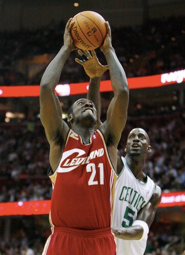 CLEVELAND - OCTOBER 27:  J.J. Hickson #21 of the Cleveland Cavaliers puts up a shot against Kevin Garnett #5 of the Boston Celtics during the season opener at Quicken Loans Arena on October 27, 2009 in Cleveland, Ohio.  <br /><br /><span class="help">(Photo by Gregory Shamus/Getty Images)</span>