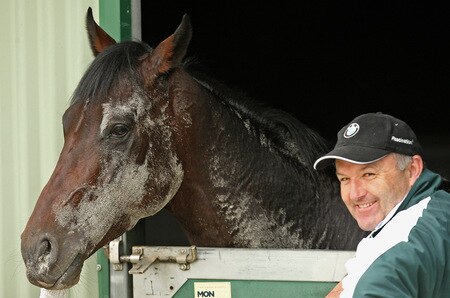 MELBOURNE, AUSTRALIA - OCTOBER 28: Trainer David Hayes looks over his horse Changing of the Guard after trackwork at Sandown Racecourse on October 28, 2009 in Melbourne, Australia.  <br /><br /><span class="help">(Photo by Quinn Rooney/Getty Images)</span>