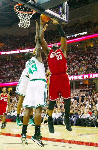 CLEVELAND - OCTOBER 27:  Shaquille O'Neal #33 of the Cleveland Cavaliers puts up a shot against Kendrick Perkins #43 of the Boston Celtics during the season opener at Quicken Loans Arena on October 27, 2009 in Cleveland, Ohio.  <br /><br /><span class="help">(Photo by Gregory Shamus/Getty Images)</span>