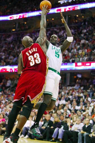 CLEVELAND - OCTOBER 27:  Kevin Garnett #5 of the Boston Celtics puts up a shot against Shaquille O'Neal #33 of the Cleveland Cavaliers during the season opener at Quicken Loans Arena on October 27, 2009 in Cleveland, Ohio.  <br /><br /><span class="help">(Photo by Gregory Shamus/Getty Images)</span>