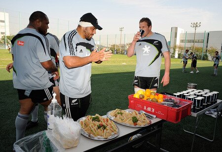 TOKYO - OCTOBER 28:  John Afoa (C) washes his hands before having a snack with Neemia Tialata (L) and Kieran Read following a New Zealand All Blacks training session at Kubota Spears Rugby Field in Chiba on October 28, 2009 in Funabashi, Japan.  <br /><br /><span class="help">(Photo by Ross Land/Getty Images)</span>