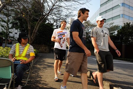 TOKYO - OCTOBER 28:  (L to R) Anthony Boric, Conrad Smith and Kieran Read walk to catch the tube on a scenic tour around Tokyo following a New Zealand All Blacks training session at Kubota Spears Rugby Field in Chiba on October 28, 2009 in Funabashi, Japan.  <br /><br /><span class="help">(Photo by Ross Land/Getty Images)</span>