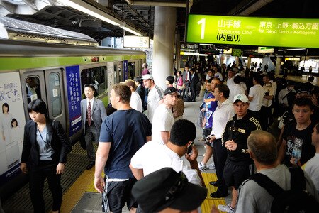 TOKYO - OCTOBER 28:  Players join the crowd to catch the tube on a scenic tour around Tokyo following a New Zealand All Blacks training session at Kubota Spears Rugby Field in Chiba on October 28, 2009 in Funabashi, Japan.  <br /><br /><span class="help">(Photo by Ross Land/Getty Images)</span>