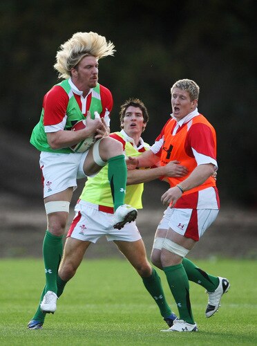CARDIFF, WALES - OCTOBER 28:  Andy Powell (L) takes a high ball as James Hook (C) and Bradley Davies look on during Wales training at the Vale Resort on October 28 ,2009 in Cardiff, Wales.  <br /><br /><span class="help">(Photo by Stu Forster/Getty Images)</span>