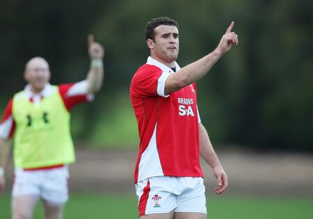 CARDIFF, WALES - OCTOBER 28:  Jamie Roberts (r) makes a point during Wales training at the Vale Resort on October 28 ,2009 in Cardiff, Wales.  <br /><br /><span class="help">(Photo by Stu Forster/Getty Images)</span>