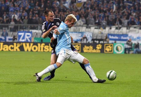 MUNICH, GERMANY - OCTOBER 28:  Stefan Aigner (R) of Muenchen battles for the ball with Heiko Westermann of Schalke during the DFB Cup round of 16 match between 1860 Muenchen and FC Schalke 04 at Allianz Arena on October 28, 2009 in Munich, Germany.  <br /><br /><span class="help">(Photo by Alexander Hassenstein/Bongarts/Getty Images)</span>
