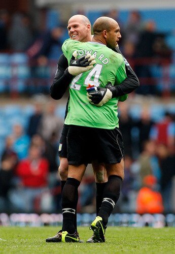 BIRMINGHAM, ENGLAND - APRIL 12:  Everton goalkeeper Tim Howard (R) embraces fellow USA keeper Brad Friedel after the Premier League match between Aston Villa and Everton at Villa Park on April 12, 2009 in Birmingham, England.  <br /><br /><span class="help">(Photo by Stu Forster/Getty Images)</span>