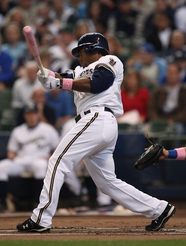 MILWAUKEE - MAY 10:  Rickie Weeks #23 of the Milwaukee Brewers, using a pink bat on "Going to Bat Against Breast Cancer" day, hits a lead-off home run against the Chicago Cubs on May 10, 2009 at Miller Park in Milwaukee, Wisconsin. <br /><br /><span class="help">(Photo by Jonathan Daniel/Getty Images)</span>
