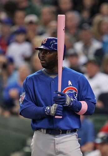 MILWAUKEE - MAY 10:  Milton Bradley #21 of the Chicago Cubs prepares to hit with a pink bat against the Milwaukee Brewers on "Going to Bat Against Breast Cancer" day on May 10, 2009 at Miller Park in Milwaukee, Wisconsin. <br /><br /><span class="help">(Photo by Jonathan Daniel/Getty Images)</span>