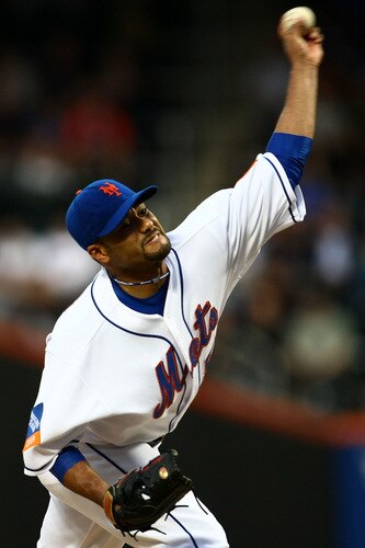 NEW YORK - JUNE 09:  Johan Santana #57 of the New York Mets pitches against the Philadelphia Phillies during their game at Citi Field on June 9, 2009 in the Flushing neighborhood of the Queens borough of New York City.  <br /><br /><span class="help">(Photo by Chris McGrath/Getty Images)</span>
