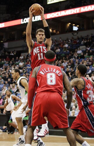 MINNEAPOLIS, MN - OCTOBER 28: Brook Lopez #11 of the New Jersey Nets pulls down a rebound against the Minnesota Timberwolves in the second quarter at the Target Center on October 28, 2009 in Minneapolis, Minnesota. <br /><br /><span class="help">(Photo by Genevieve Ross/Getty Images)</span>
