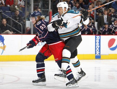 COLUMBUS, OH - NOVEMBER 04:  Manny Malhotra #27 of the San Jose Sharks tries to get around Jakub Voracek #93 of the Columbus Blue Jackets on November 4, 2009 at Nationwide Arena in Columbus, Ohio. San Jose won the game 3-2 in a shootout.  <br /><br /><span class="help">(Photo by Gregory Shamus/Getty Images)</span>