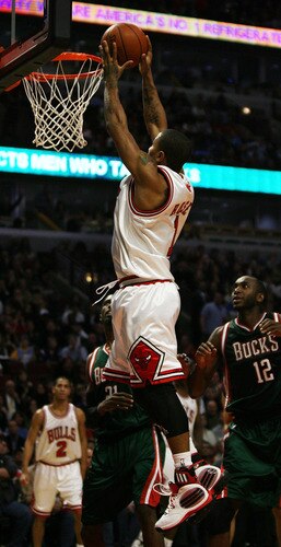 CHICAGO - NOVEMBER 03: Derrick Rose #1 of the Chicago Bulls goes up for a dunk over Luc Mbah a Moute #12 of the Milwaukee Bucks at the United Center on November 3, 2009 in Chicago, Illinois. The Bulls defeated the Bucks 83-81. <br /><br /><span class="help">(Photo by Jonathan Daniel/Getty Images)</span>