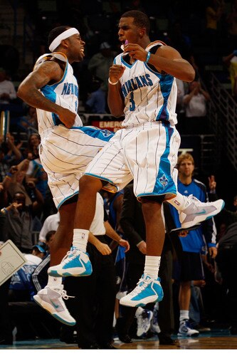 NEW ORLEANS - NOVEMBER 04:  Chris Paul #3 and Bobby Brown #6 of the New Orleans Hornets celebrate during the game against the Dallas Mavericks at New Orleans Arena on November 4, 2009 in New Orleans, Louisiana.  The Hornets defeated the Mavericks 114-109 in overtime.  <br /><br /><span class="help">(Photo by Chris Graythen/Getty Images)</span>